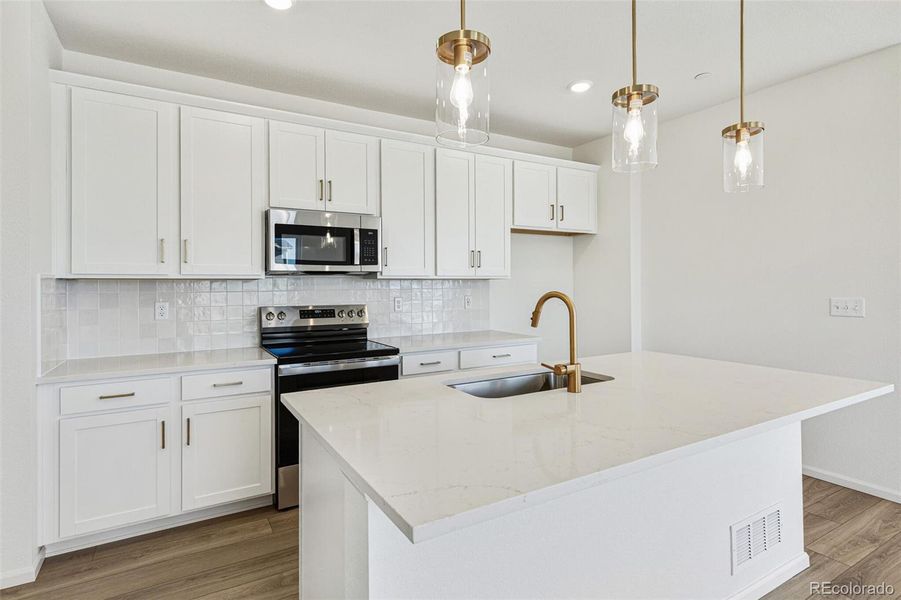Furnished interior view inside a new home in Turnberry Villas, Commerce City (Image 13).