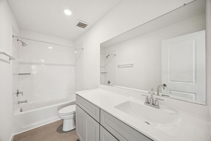 Furnished interior view inside a new home in Decker Farms, Magnolia (Image 7).