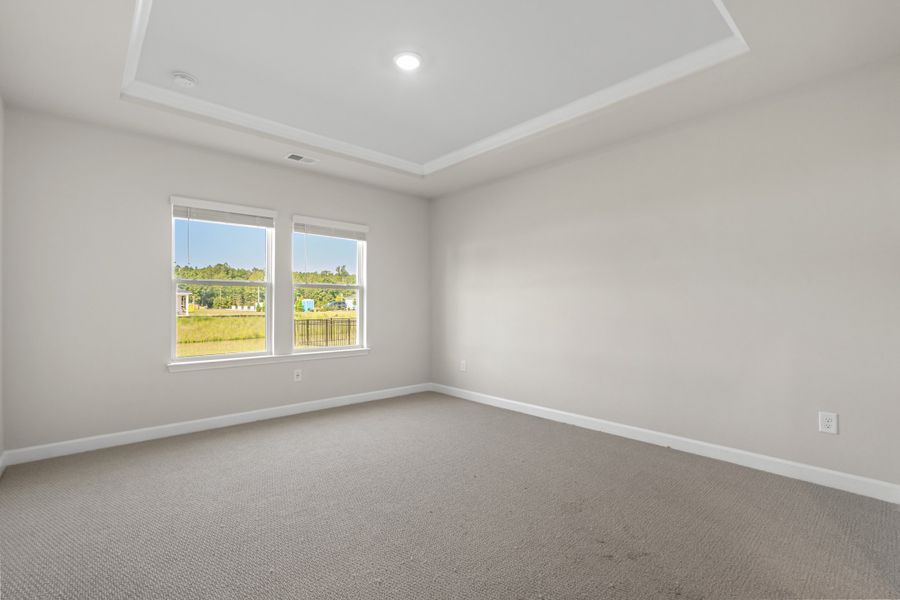 Spacious, unfurnished interior of a new home in Cypress Ridge - The Boardwalk Series, Longs (Image 16).