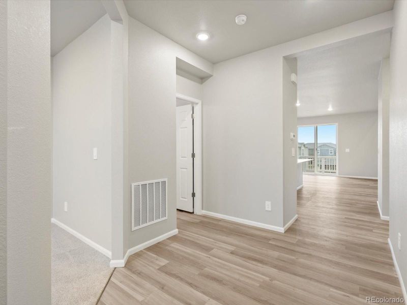 Spacious, unfurnished interior of a new home in Buffalo Highlands: The Flora Collection, Commerce City (Image 18). Spacious, unfurnished interior of a new home in Buffalo Highlands: The Flora Collection, Commerce City (Image 18).