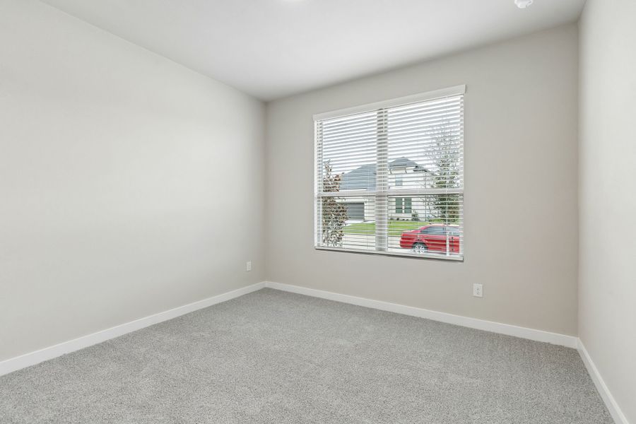 Bedroom in the Winters home plan by Trophy Signature Homes – REPRESENTATIVE PHOTO