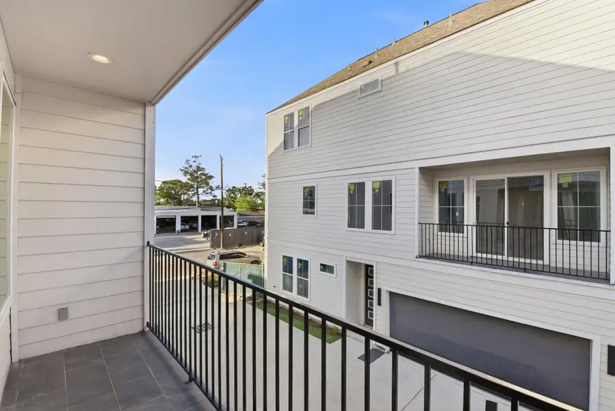 Exterior details and patio area of a home in , Houston (Image 28).