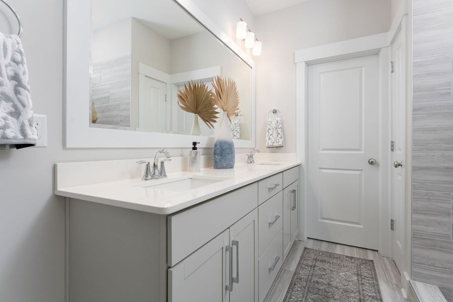 Furnished interior view inside a new home in The Bluffs at Lake Waccamaw, Lake Waccamaw (Image 12).
