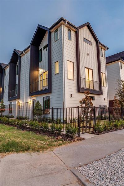 Front exterior of a new home in , Dallas, TX, highlighting curb appeal (Image 30). Front exterior of a new home in , Dallas, TX, highlighting curb appeal (Image 30).