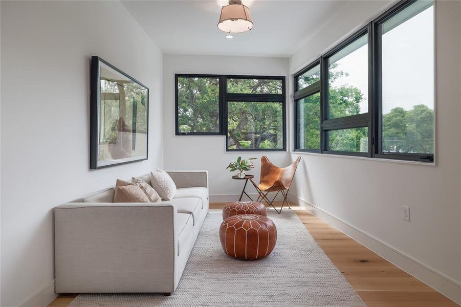 The second flex space sits at the top of the stairs on the second floor. This could be a second living room, game room, play room, studio, second office or any number of other uses.