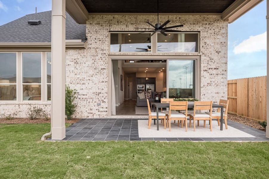 Exterior details and patio area of a home in Woodson’s Reserve 45′, Spring (Image 3).