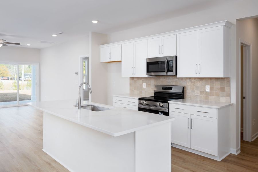 Furnished interior view inside a new home in River Tide Farms, Bolivia (Image 8). Furnished interior view inside a new home in River Tide Farms, Bolivia (Image 8).