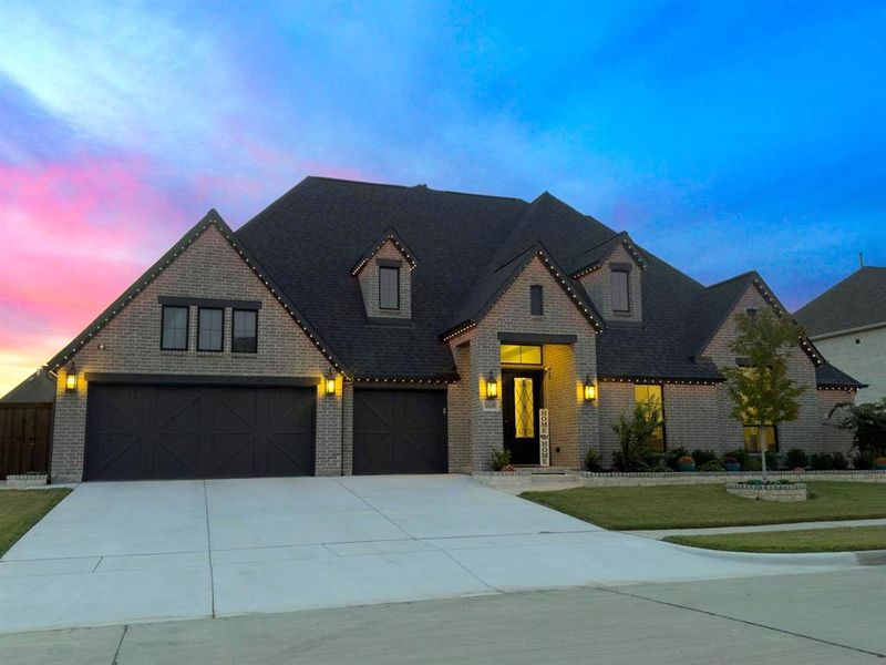 Front exterior of a new home in , McLendon-Chisholm, TX, highlighting curb appeal (Image 24). Front exterior of a new home in , McLendon-Chisholm, TX, highlighting curb appeal (Image 24).