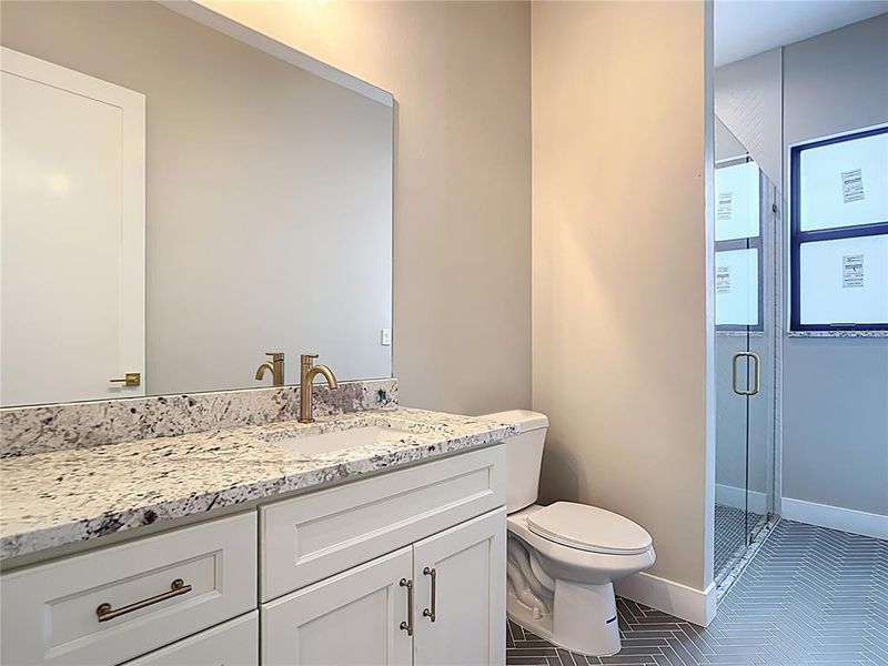 guest bathroom with exit to pool area guest bathroom with exit to pool area