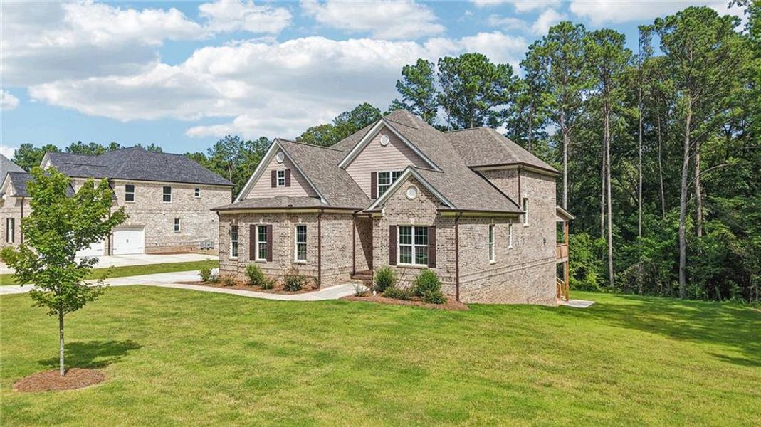 Front exterior of a new home in , Douglasville, GA, highlighting curb appeal (Image 14).