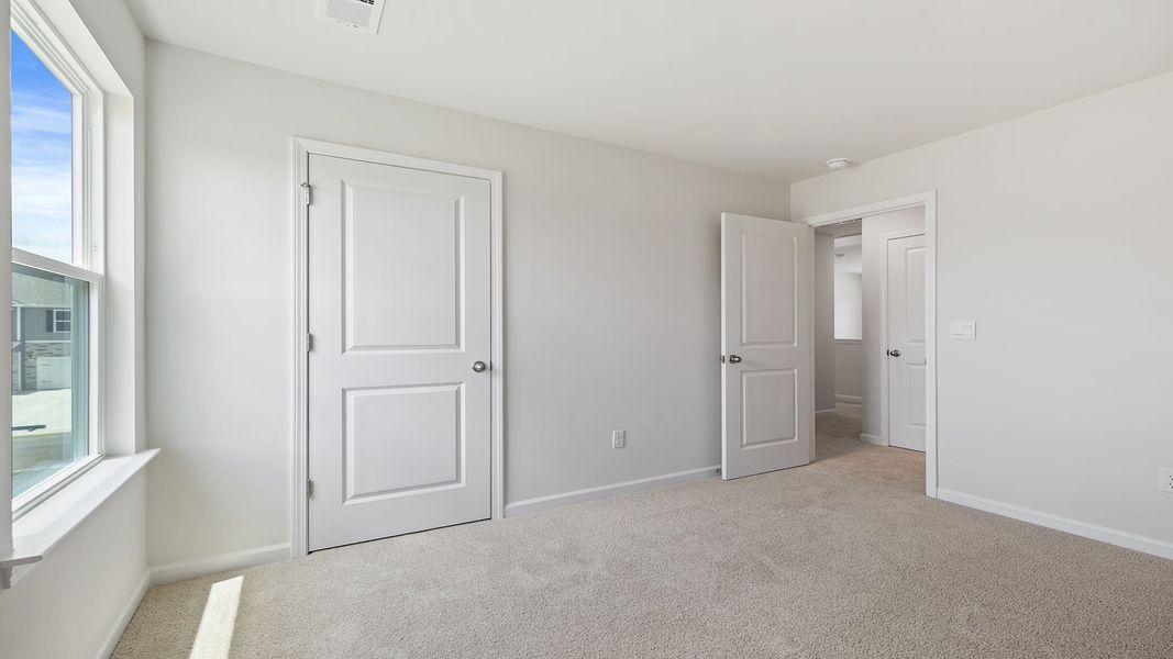 Spacious, unfurnished interior of a new home in Durbin Meadows Traditions, Fountain Inn (Image 24).