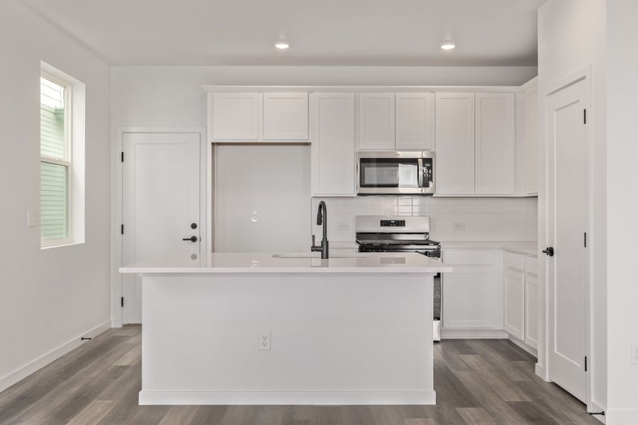 Furnished interior view inside a new home in Painted Prairie, Aurora (Image 6).
