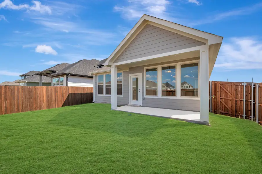 Exterior details and patio area of a home in The Meadows, Denton (Image 3). Exterior details and patio area of a home in The Meadows, Denton (Image 3).
