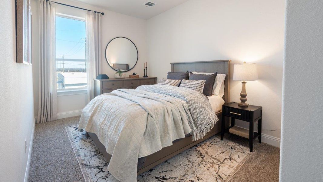 Representative furnished interior of a home built from the Picasso by D.R. Horton in Waterbend, Euless (Image 11).