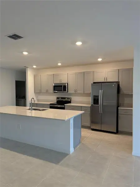 Furnished interior view inside a new home in Aden South at Westview, Kissimmee (Image 4). Furnished interior view inside a new home in Aden South at Westview, Kissimmee (Image 4).