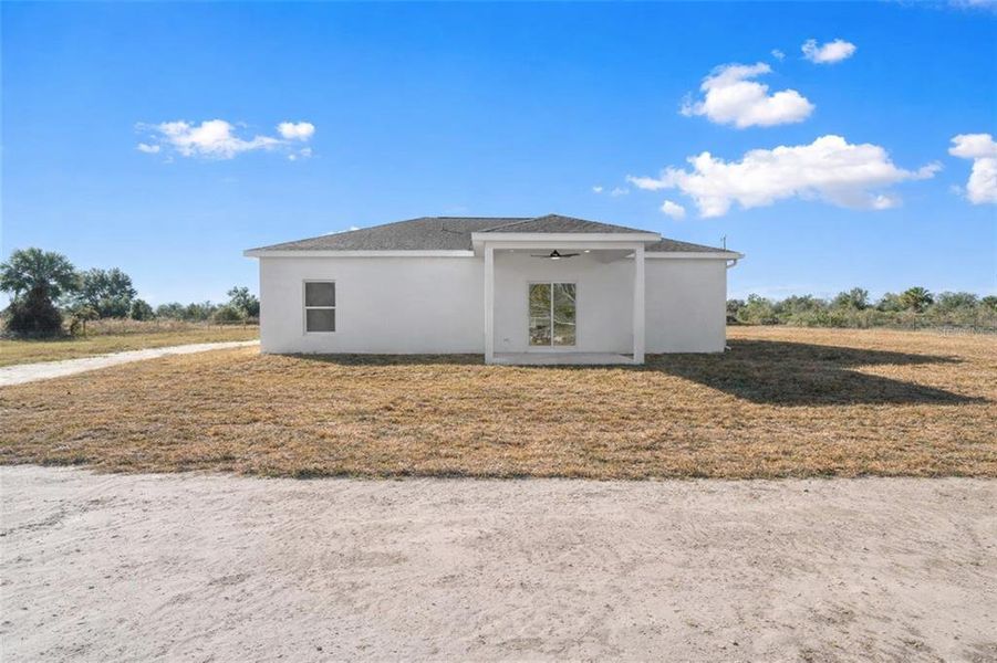 Exterior details and patio area of a home in , Okeechobee (Image 28).
