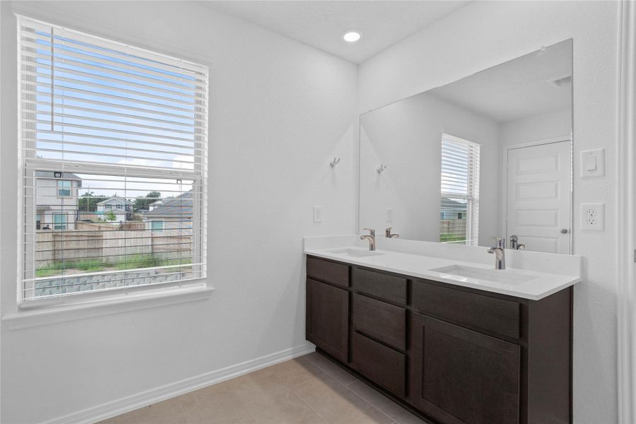 Furnished interior view inside a new home in Oakwood Trails, Tomball (Image 11).