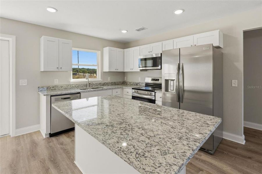 Furnished interior view inside a new home in , Avon Park (Image 4).