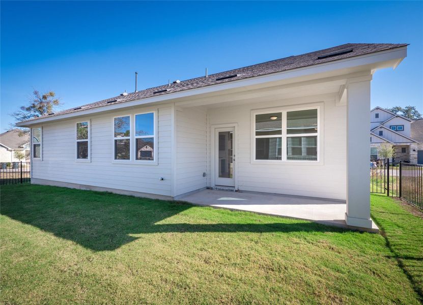 Exterior details and patio area of a home in Anthem Cottages, Kyle (Image 3).