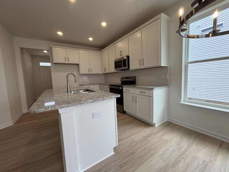 Furnished interior view inside a new home in CraigStone, Woodruff (Image 5).