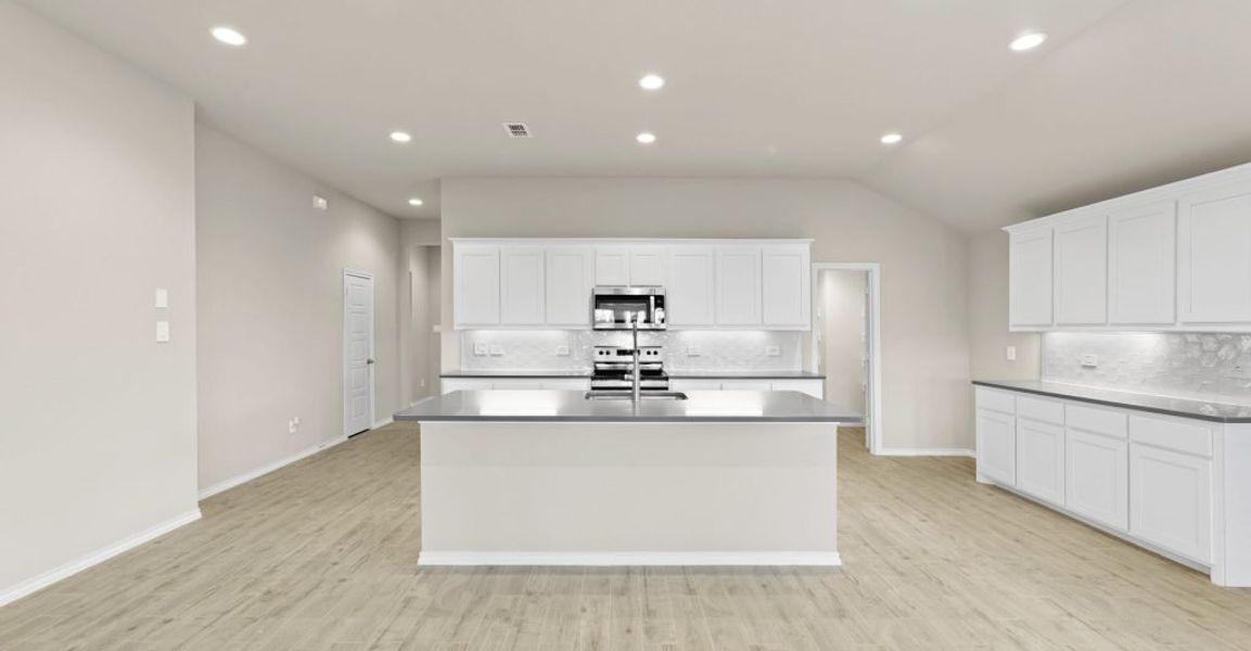 Representative exterior photo of a completed home built from the Lincoln by Impression Homes in Keeneland, Aubrey, TX (Image 4). Representative exterior photo of a completed home built from the Lincoln by Impression Homes in Keeneland, Aubrey, TX (Image 4).