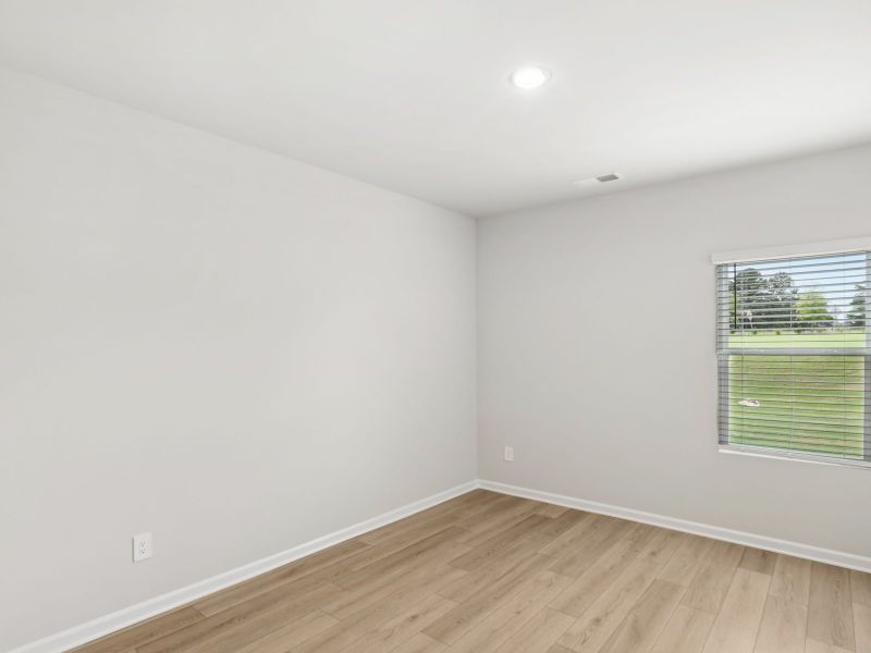 Spacious, unfurnished interior of a new home in River Glen, Angier (Image 12).