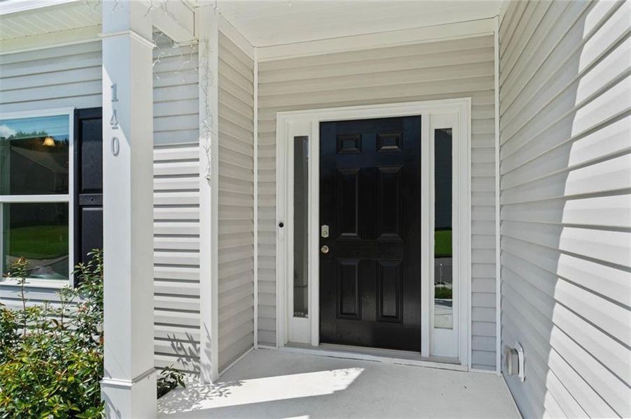 Front exterior of a new home in , Dallas, GA, highlighting curb appeal (Image 2). Front exterior of a new home in , Dallas, GA, highlighting curb appeal (Image 2).