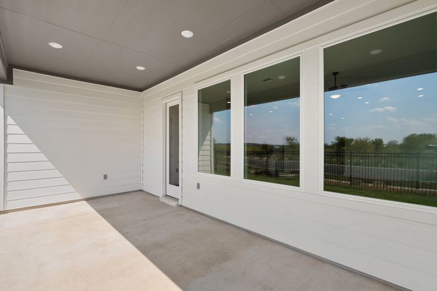 Exterior details and patio area of a home in Lagos Reserve, Manor (Image 25).