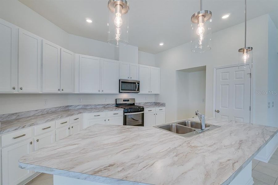 Furnished interior view inside a new home in Somerset - Executive Series, Palm Coast (Image 6).