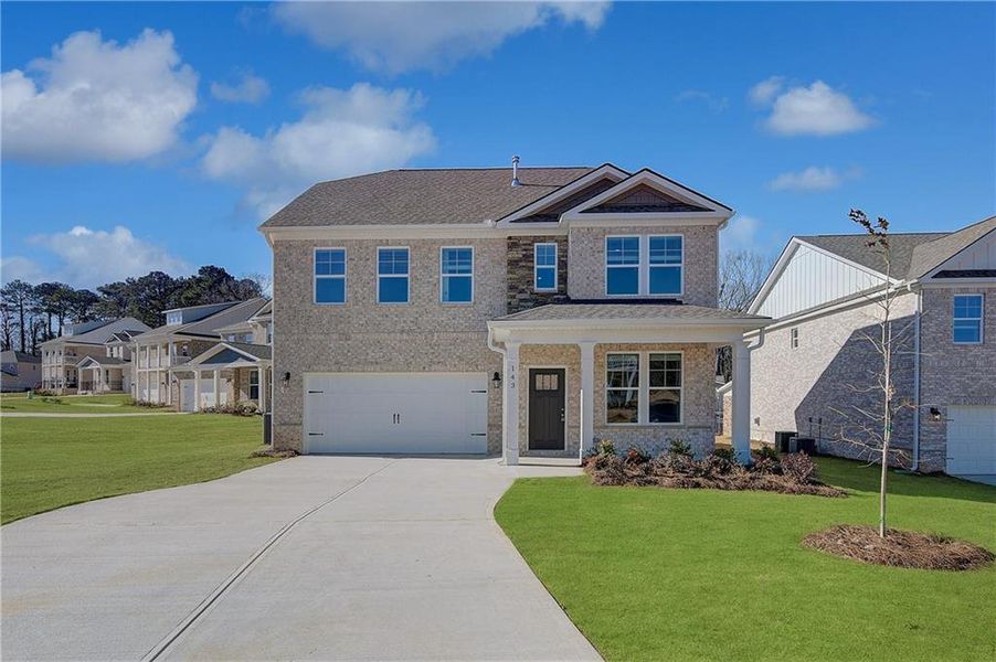 Front exterior of a new home in Burchwood, Stockbridge, GA, highlighting curb appeal (Image 17).