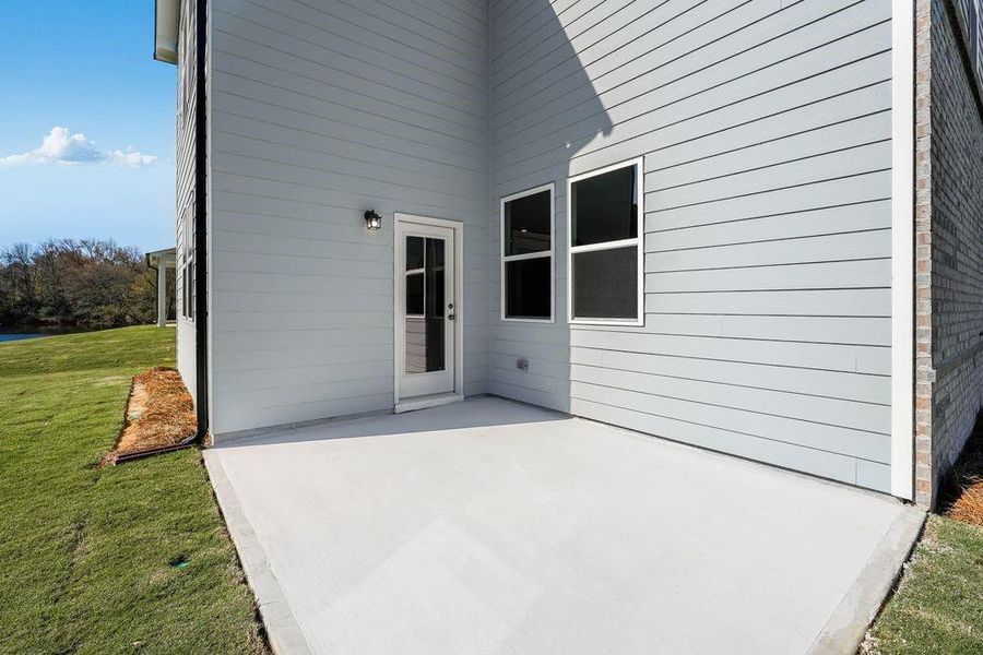 Exterior details and patio area of a home in Windance Lake, Loganville (Image 3).
