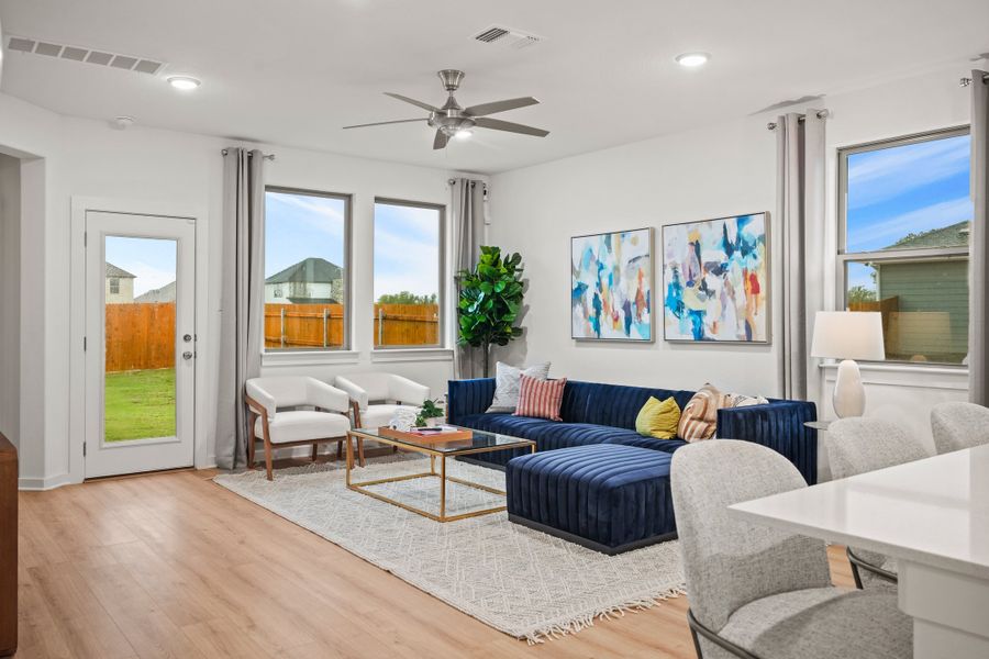 Living Room in a Trinity Ranch Oak Model home in Elgin TX by Trophy Signature Homes