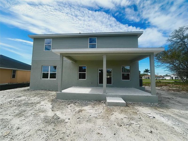 Exterior details and patio area of a home in Deep Creek, Punta Gorda (Image 3).