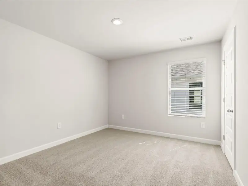 Spacious, unfurnished interior of a new home in Brayfield Manor - Heritage Collection, Wellford (Image 23).