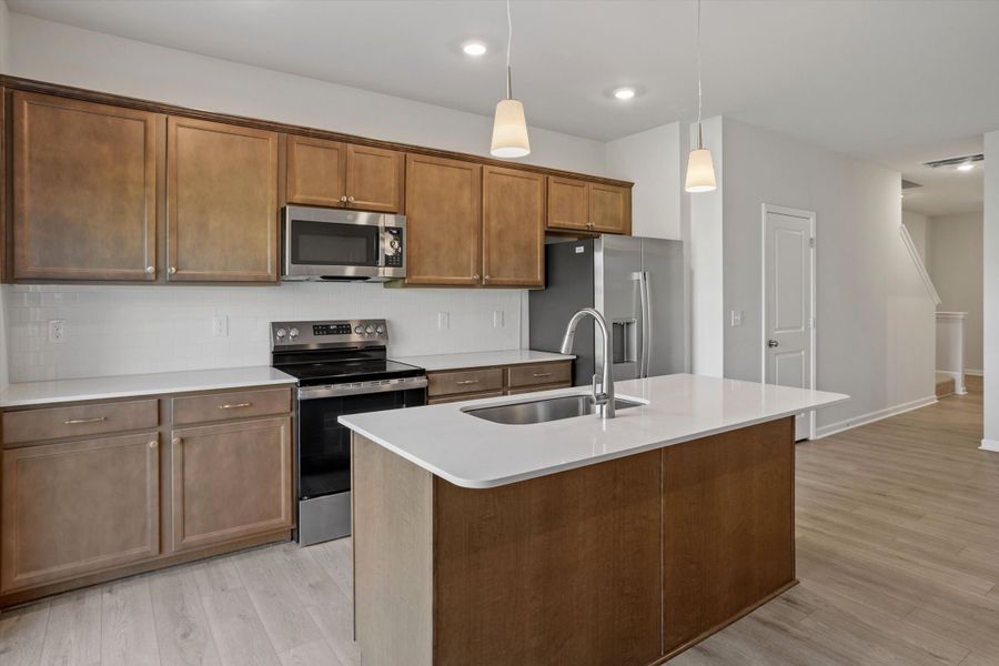 Furnished interior view inside a new home in West Main Townhomes, Sanford (Image 8).