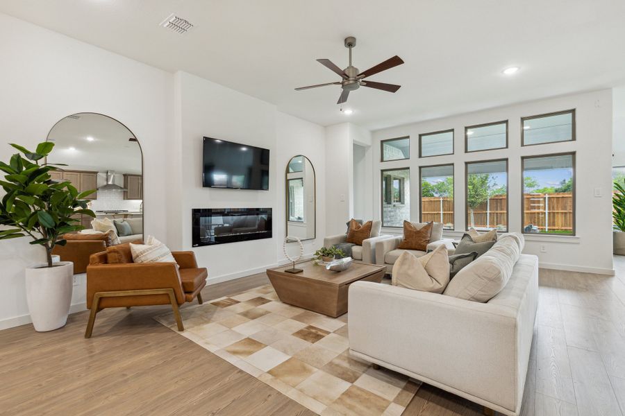 Living room in the Gilmour home plan by Trophy Signature Homes – REPRESENTATIVE PHOTO