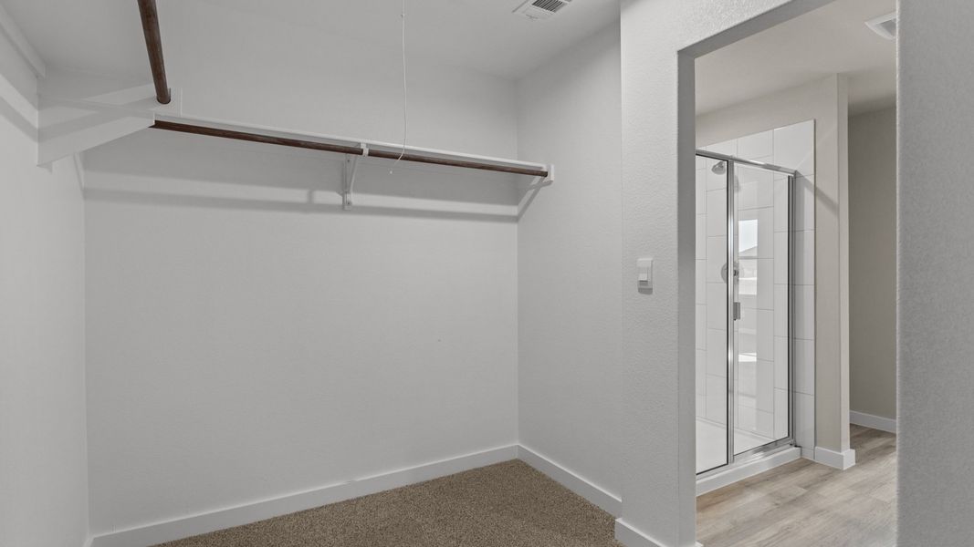 Representative unfurnished interior of a home built from the JUSTIN by D.R. Horton in Homestead at Parks Bell Ranch, Odessa (Image 16).
