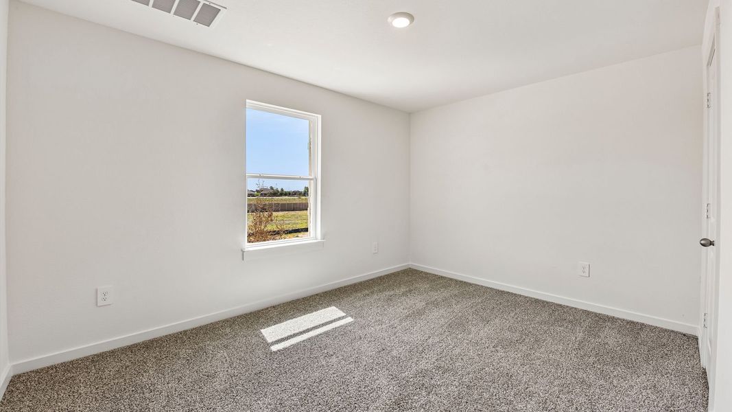 Spacious, unfurnished interior of a new home in Monarch Ranch, Manor (Image 39).