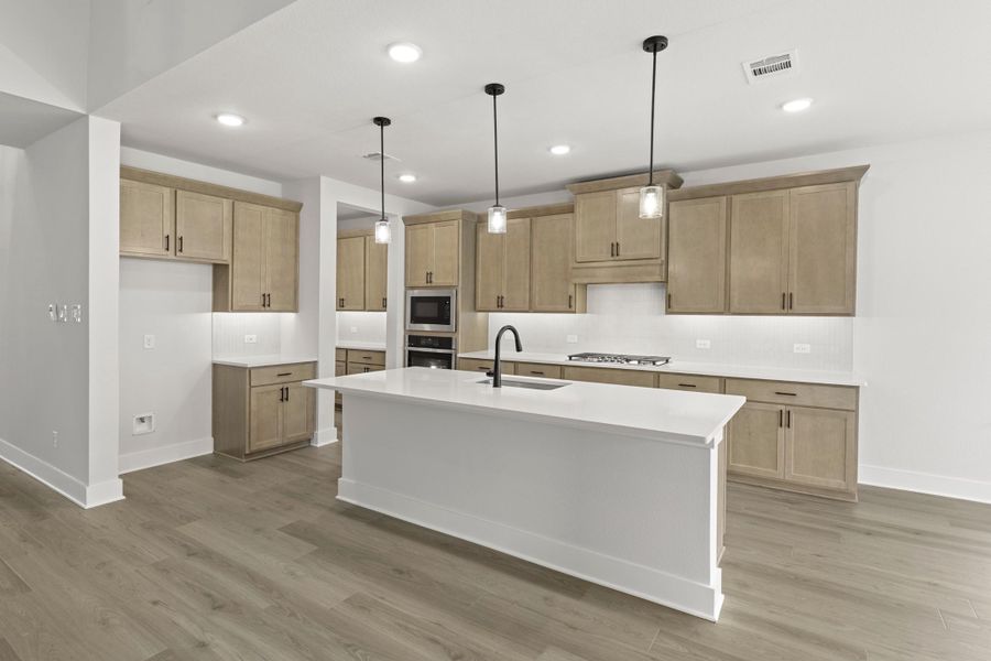 Furnished interior view inside a new home in Union Park, Little Elm (Image 6).