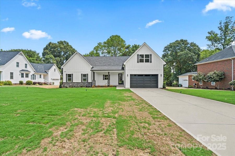 Front exterior of a new home in , Lancaster, SC, highlighting curb appeal (Image 24). Front exterior of a new home in , Lancaster, SC, highlighting curb appeal (Image 24).