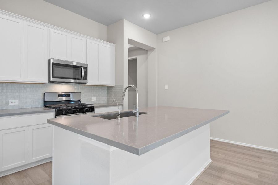 Furnished interior view inside a new home in The Highlands 45', Porter (Image 5).