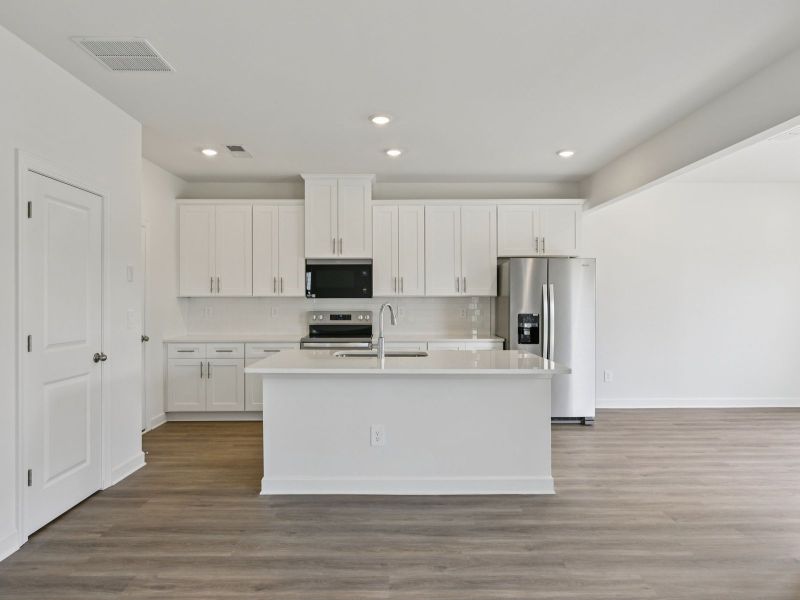 Furnished interior view inside a new home in Buffalo Ridge, Newton (Image 3).