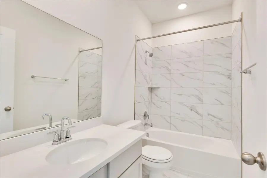 Full bathroom with shower / bathtub combination and vanity