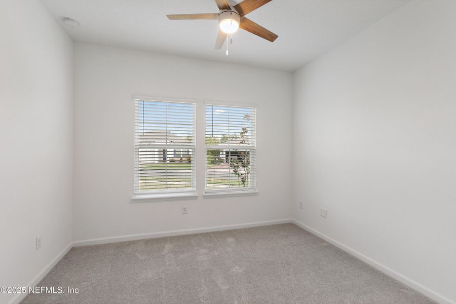 Spacious, unfurnished interior of a new home in Tributary: Lakeview at Tributary 50's, Yulee (Image 14).