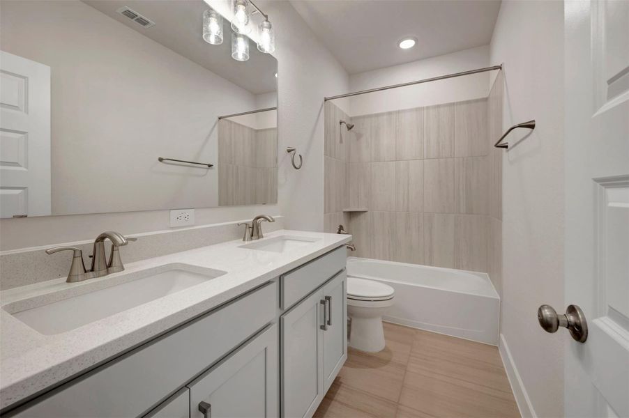 Furnished interior view inside a new home in Elyson - Grove Row Collection, Katy (Image 5). Furnished interior view inside a new home in Elyson - Grove Row Collection, Katy (Image 5).