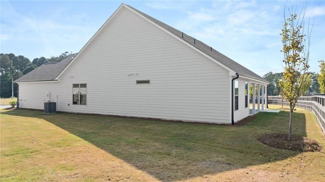 Exterior details and patio area of a home in Soleil Summit Chase, Snellville (Image 34).