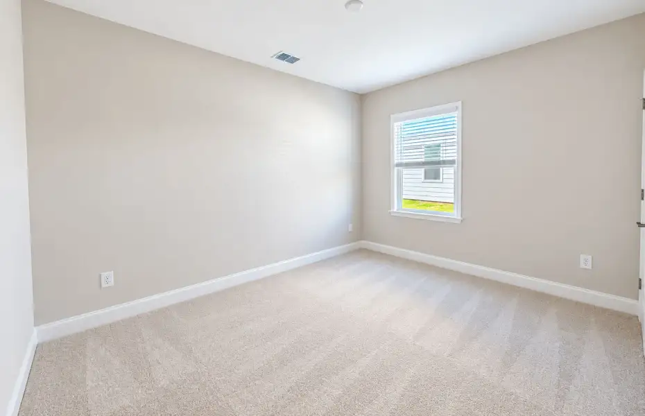 Spacious, unfurnished interior of a new home in Southport Meadows, Southport (Image 10).