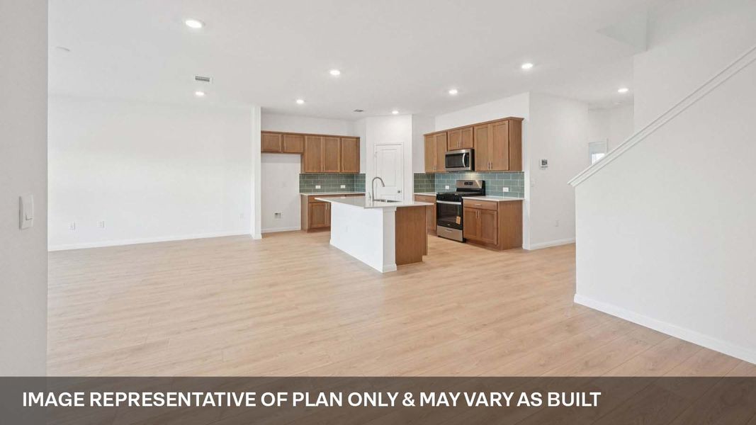 Representative furnished interior of a home built from the The Ozark by D.R. Horton in Bar W Ranch, Leander (Image 3).