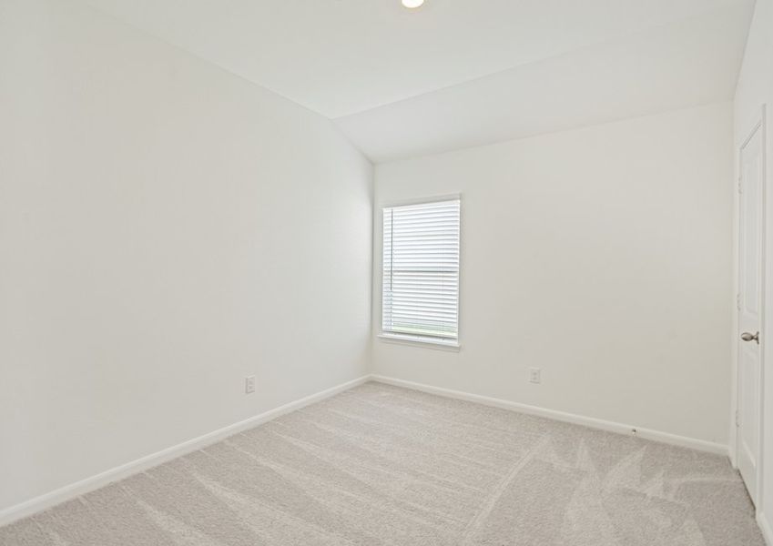 Both secondary bedrooms feature lush carpet
