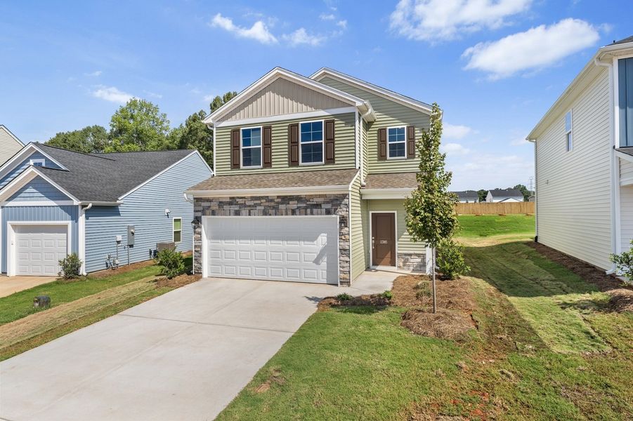 Front exterior of a new home in Mayfair Village, Spartanburg, SC, highlighting curb appeal (Image 2). Front exterior of a new home in Mayfair Village, Spartanburg, SC, highlighting curb appeal (Image 2).